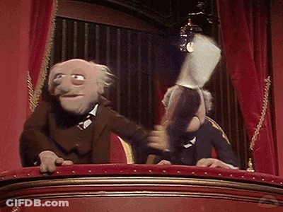 Two Muppets On Balcony With Red Curtain GIF