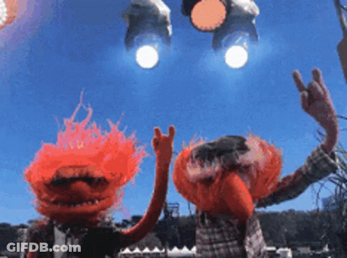 Two Muppets With Red Hair Giving Peace Sign GIF