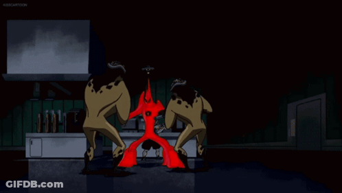Two Naked Men Standing By Red Wall With Kidcartoon GIF