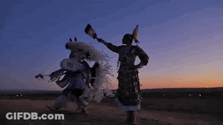 Two Native Americans Dancing At Sunset GIF