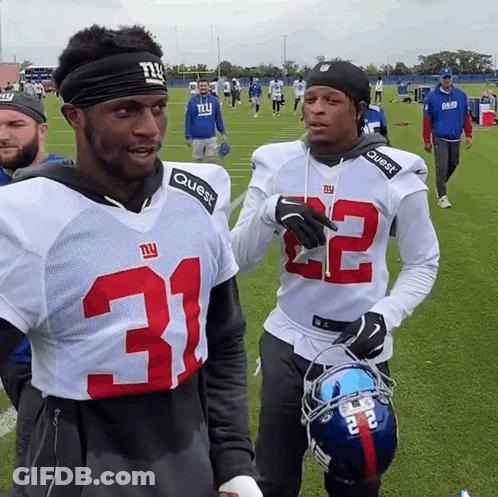 Two New York Giants Football Players Are Talking GIF