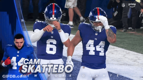Two New York Giants Football Players GIF