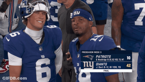 Two New York Giants Players Posing GIF