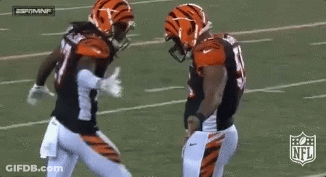 Two NFL Football Players Dancing On Field GIF