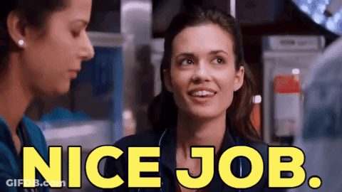 Two Nurses Are Talking To Each Other In A Hospital Room And One Of Them Is Smiling And Saying `` Nice Job '' . GIF