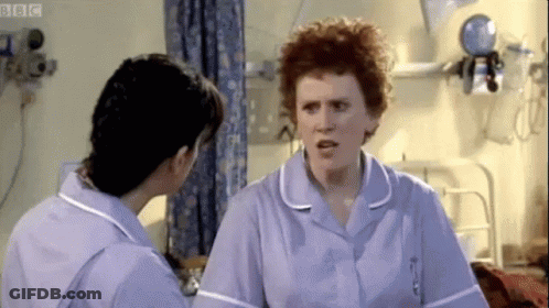 Two Nurses Talking In Hospital Room GIF