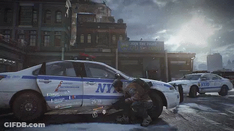 Two Nypd Cars Are Parked In Front Of A Building GIF