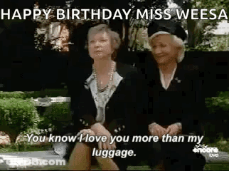 Two Older Women Sitting On Park Bench Talking GIF