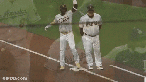 Two Padres Baseball Players Standing On Field GIF