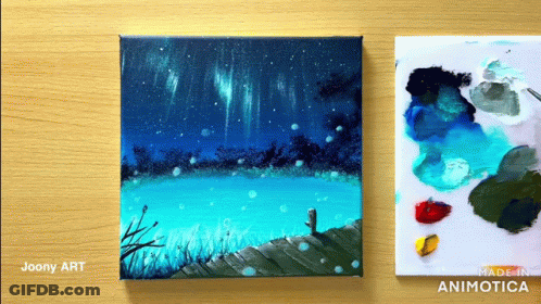 Two Paintings On Wooden Table By Joony Art And Made In Animatica GIF