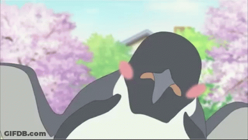 Two Penguins Are Kissing In Front Of A Cherry Blossom Tree GIF