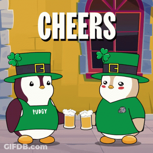 Two Penguins In Green Hats And Shirts Cheers GIF