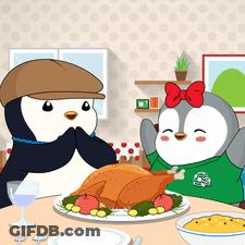 Two Penguins Sitting At Table With Turkey GIF