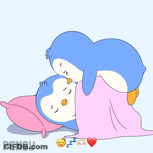 Two Penguins Sleeping Under Pink Blanket GIF