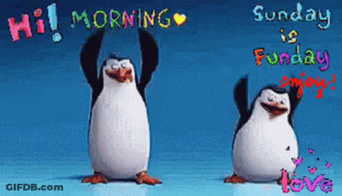 Two Penguins Standing Together GIF