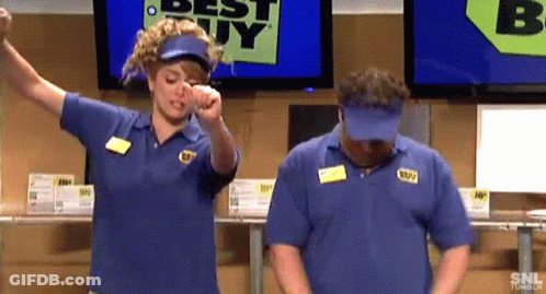 Two People Are Dancing In Front Of A Best Buy Sign GIF