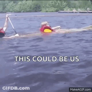 Two People Are Rowing Kayaks In The Water And The Words `` This Could Be Us '' Are Visible . GIF