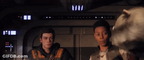 Two People Are Standing Next To Each Other In A Dark Room . GIF
