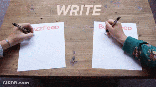 Two People Are Writing On A Wooden Table With The Words Write Buzzfeed And Buzzed GIF