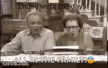 Two People At Table Saying Those Were The Days GIF