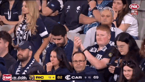 Two People Dancing In Front Of Disco Ball GIF