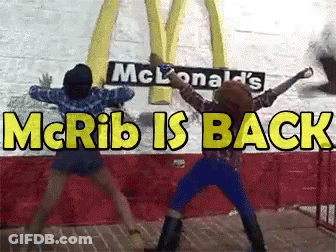 Two People Dancing In Front Of McDonald's Sign GIF