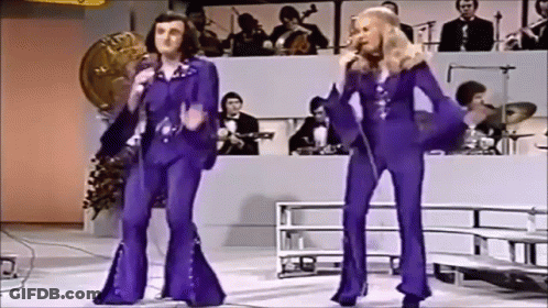 Two People Dancing In Purple Pants GIF