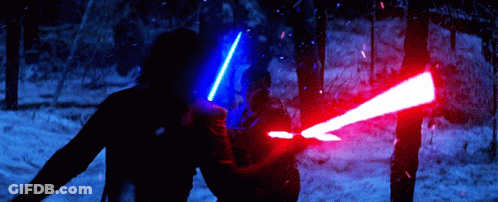 Two People Fighting With Lightsabers GIF