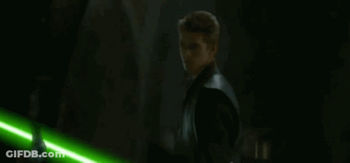 Two People Fighting With Lightsabers GIF