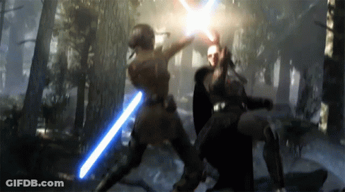 Two People Fighting With Lightsabers In A Forest GIF