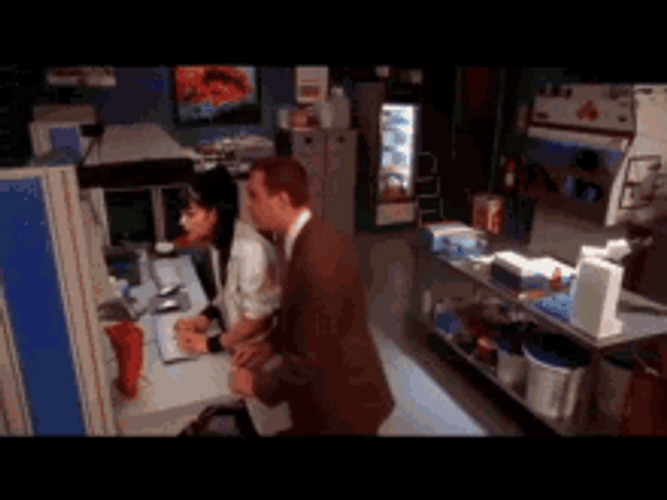 Two People Hacking Using One Keyboard GIF