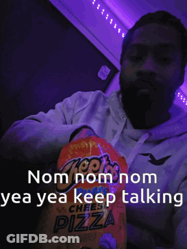 Two People Holding Ace Comb In Sand GIF