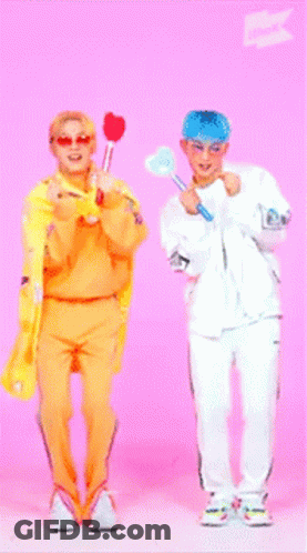 Two People Holding Hearts On Pink Background GIF