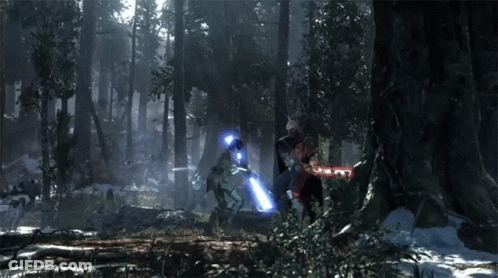 Two People Holding Lightsabers In Forest GIF