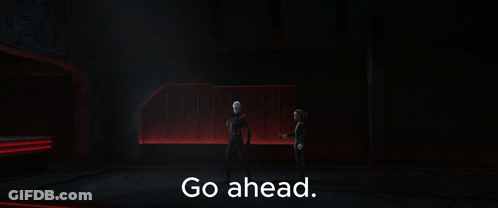 Two People In Dark Room Saying Go Ahead GIF