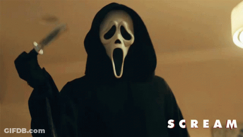 Two People In Scream Masks In Dark Room GIF