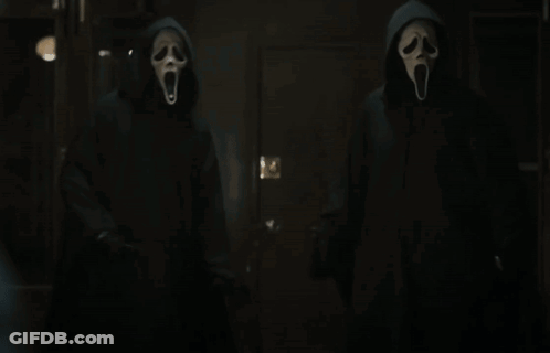 Two People In Scream Masks GIF