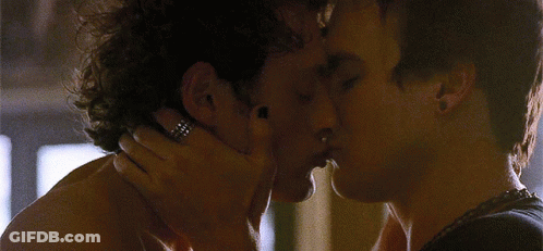 Two People Kissing With Ring GIF