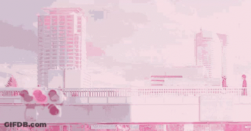 Two People On Bridge Over River GIF