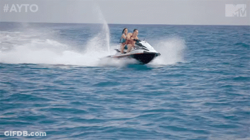 Two People Riding A Jet Ski In The Ocean With The Hashtag #Ayo GIF
