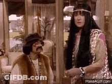 Two People Standing In Living Room GIF