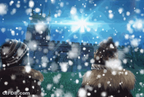 Two People Stargazing In Snowfall GIF