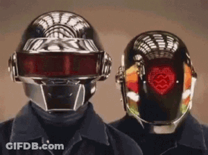 Two People With Heart Helmets GIF
