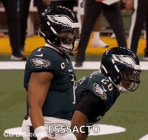 Two Philadelphia Eagles Players Side By Side GIF