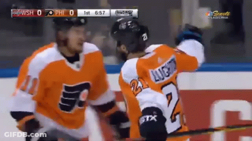 Two Philadelphia Flyers Hockey Players Celebrate A Goal GIF