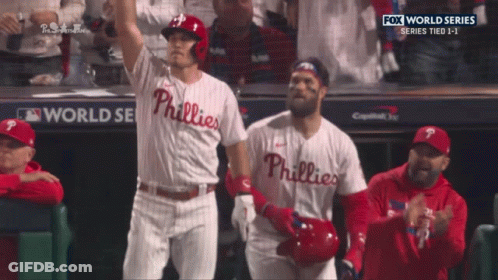 Two Phillies Baseball Players Celebrate A Home Run GIF