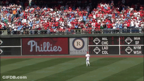 Two Phillies Baseball Players In Dugout GIF
