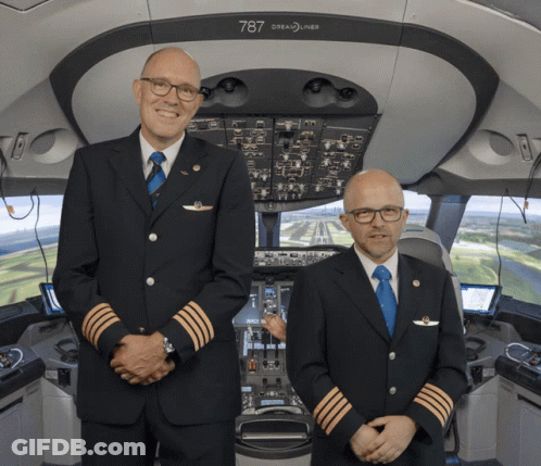 Two Pilots At 787 Dreamliner Cockpit GIF