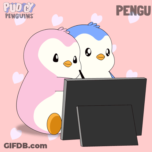 Two Pink And Blue Penguins Hugging In Front Of Computer Screen GIF