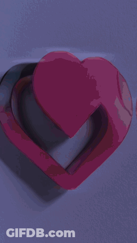 Two Pink Hearts Stacked GIF